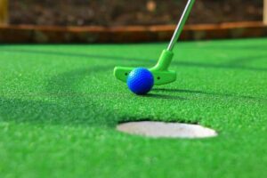 mini-golf-ball-and-a-green-club-2061830033